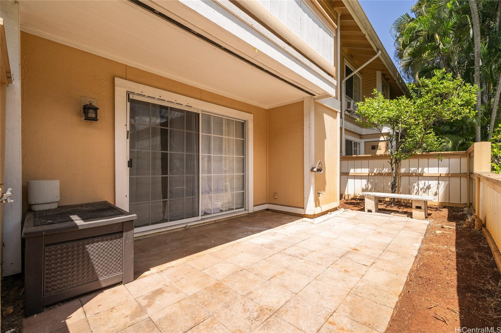 625 Mananai Place, Unit 24A Honolulu, HI 96818 - Photo 12 of 18 a backyard of a house with seating space