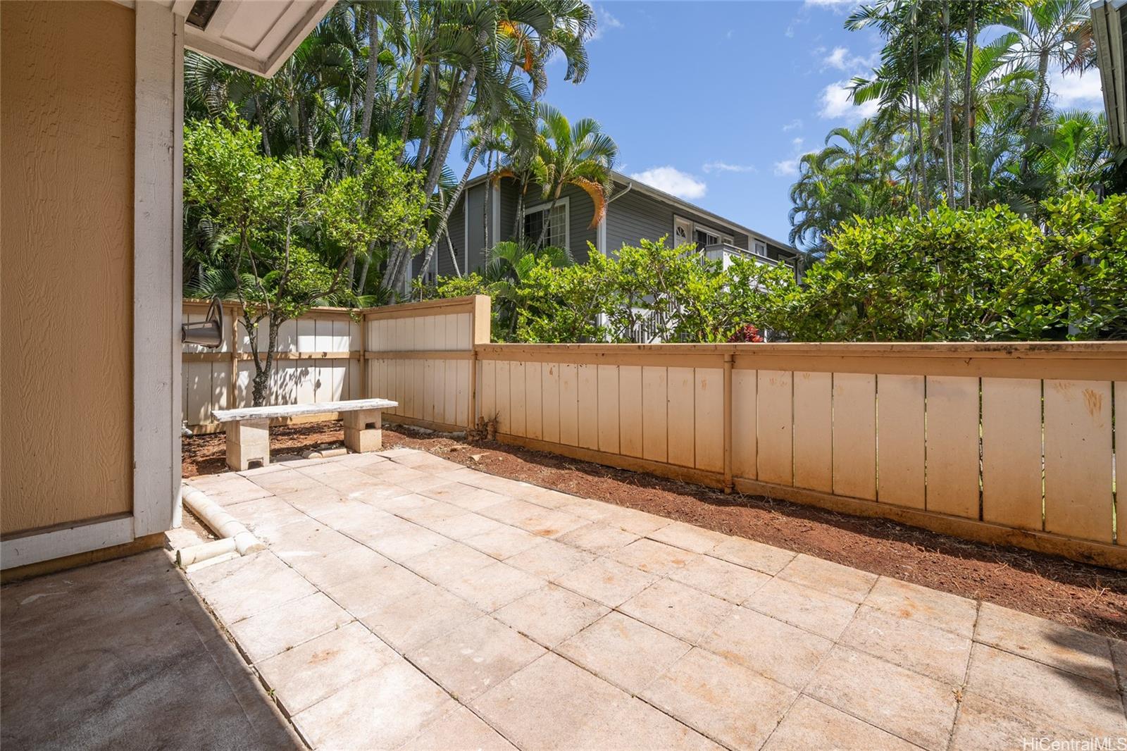625 Mananai Place, Unit 24A Honolulu, HI 96818 - Photo 13 of 18 a view of backyard with a patio and plants