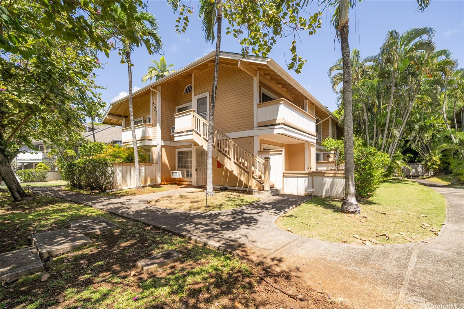 625 Mananai Place, Unit 24A Honolulu, HI 96818 - Photo 14 of 18 a view of a house with a yard