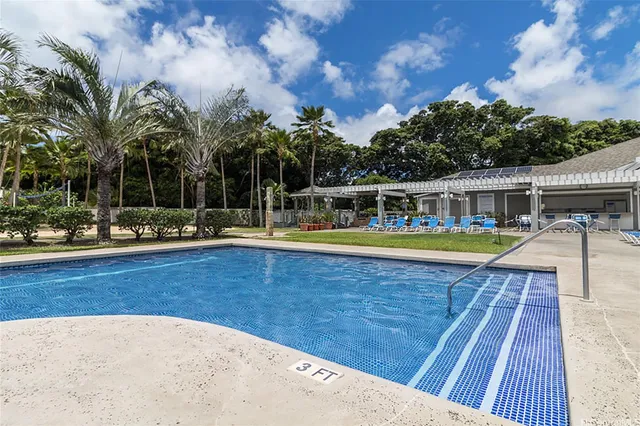 swimming pool with outdoor seating
