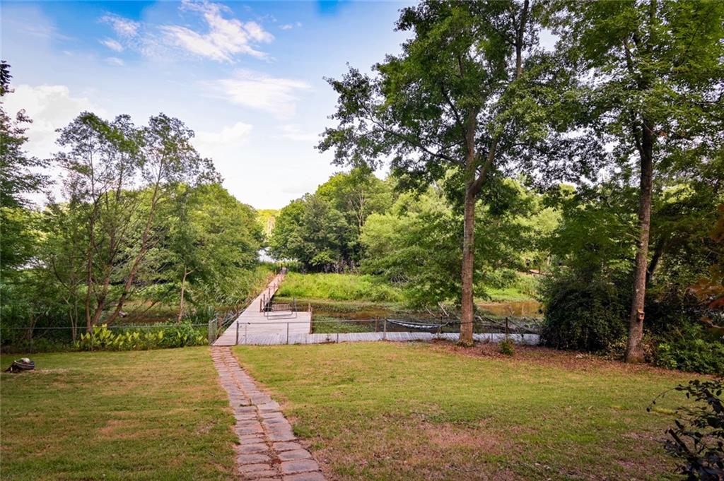 458 Haley Road Jackson, GA 30233 - Photo 38 of 47 a view of yard with swimming pool and trees