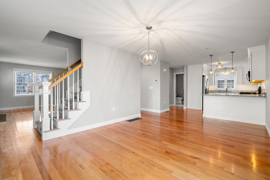 8 Comanche Circle, Unit 4 Haverhill, MA 01835 - Photo 12 of 19 a view of empty room with wooden floor