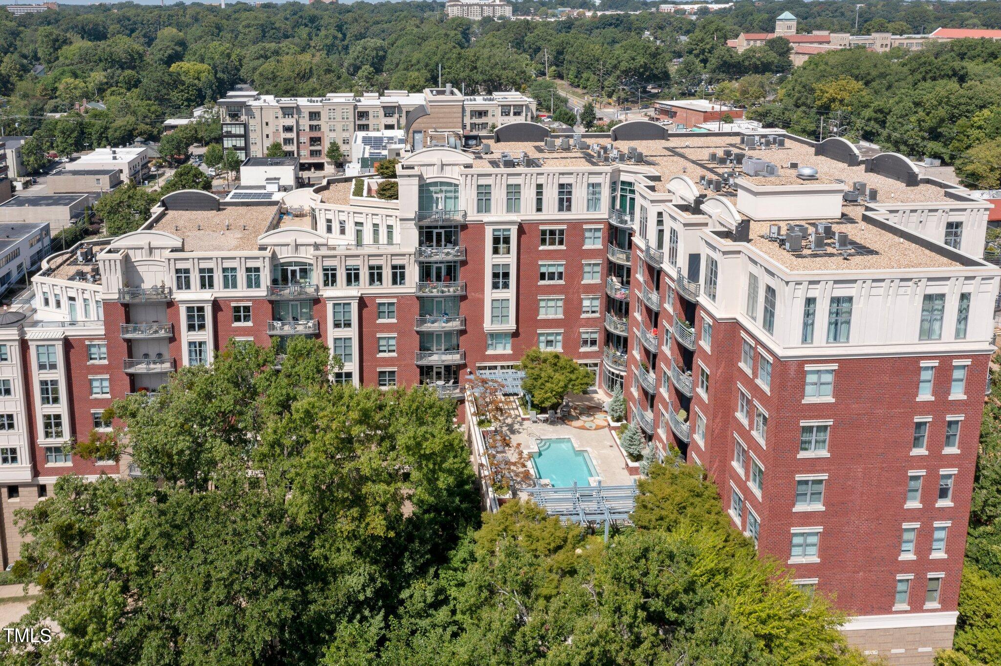 a large building with a lot of plants