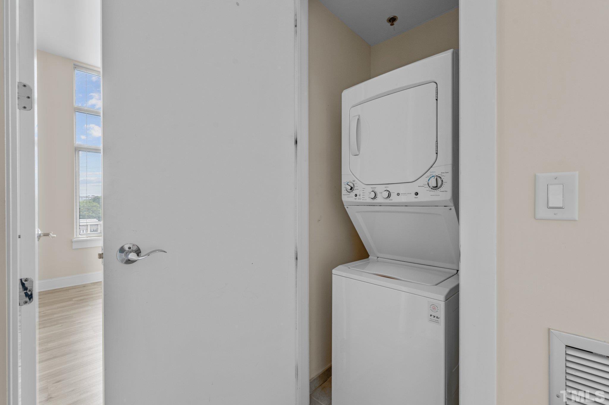618 North Boylan Avenue, Unit 1032 Raleigh, NC 27603 - Photo 13 of 69 a utility room with dryer and washer