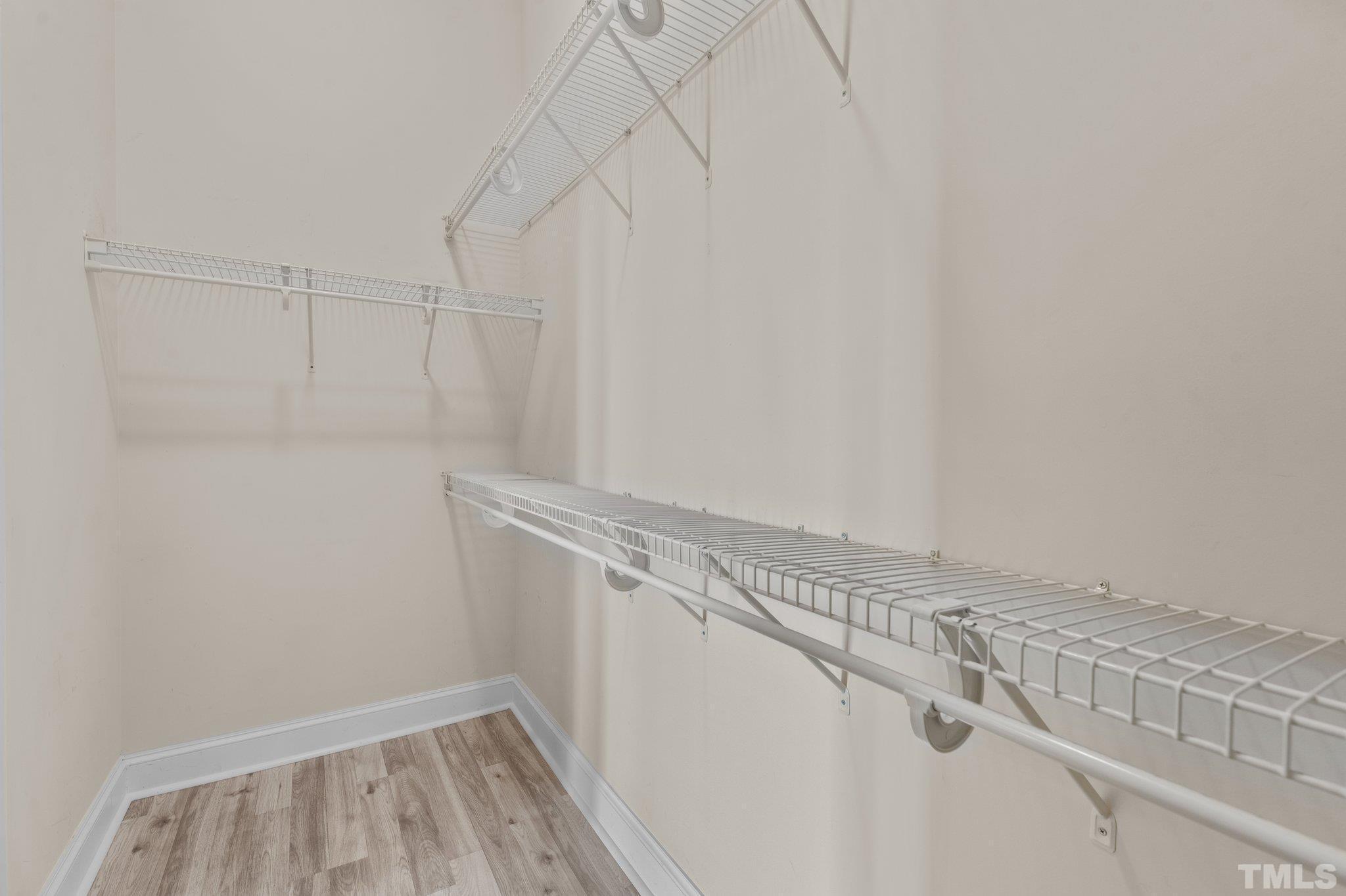 618 North Boylan Avenue, Unit 1032 Raleigh, NC 27603 - Photo 20 of 69 a view of a room with racks on the wall