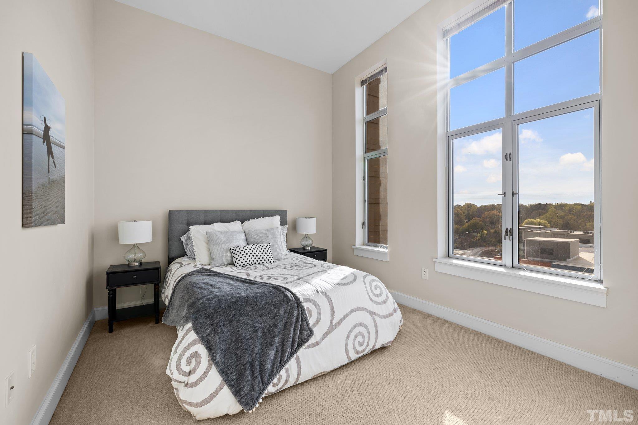 618 North Boylan Avenue, Unit 1032 Raleigh, NC 27603 - Photo 22 of 69 a bedroom with a bed and a window