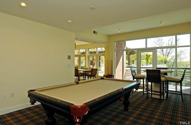 a view of building with outdoor space and seating area