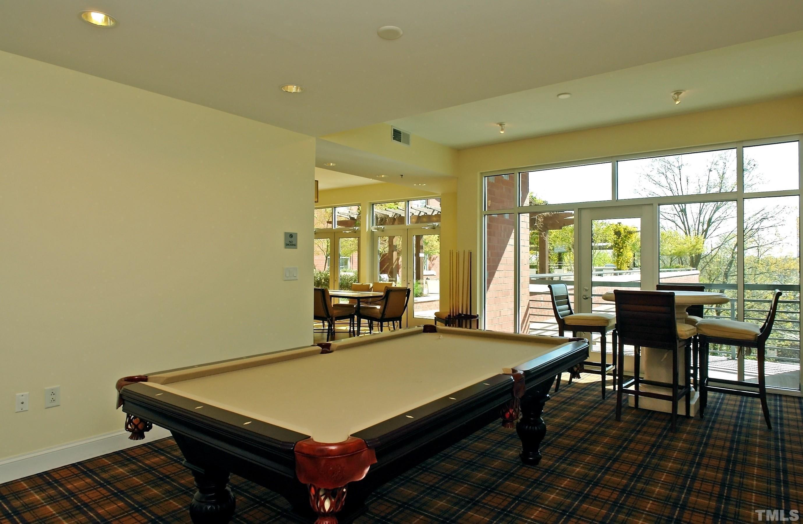 618 North Boylan Avenue, Unit 1032 Raleigh, NC 27603 - Photo 40 of 69 a room with furniture pool table and glass windows