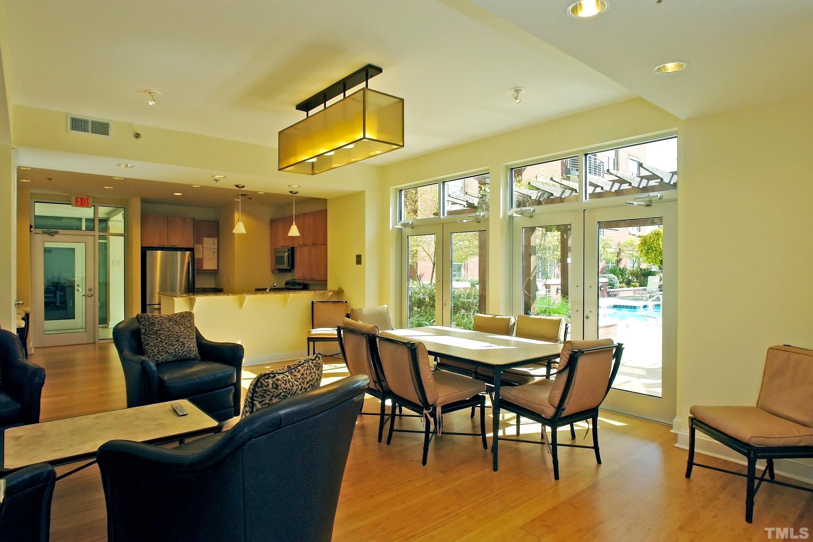618 North Boylan Avenue, Unit 1032 Raleigh, NC 27603 - Photo 41 of 69 a view of a dining room with furniture window and outside view