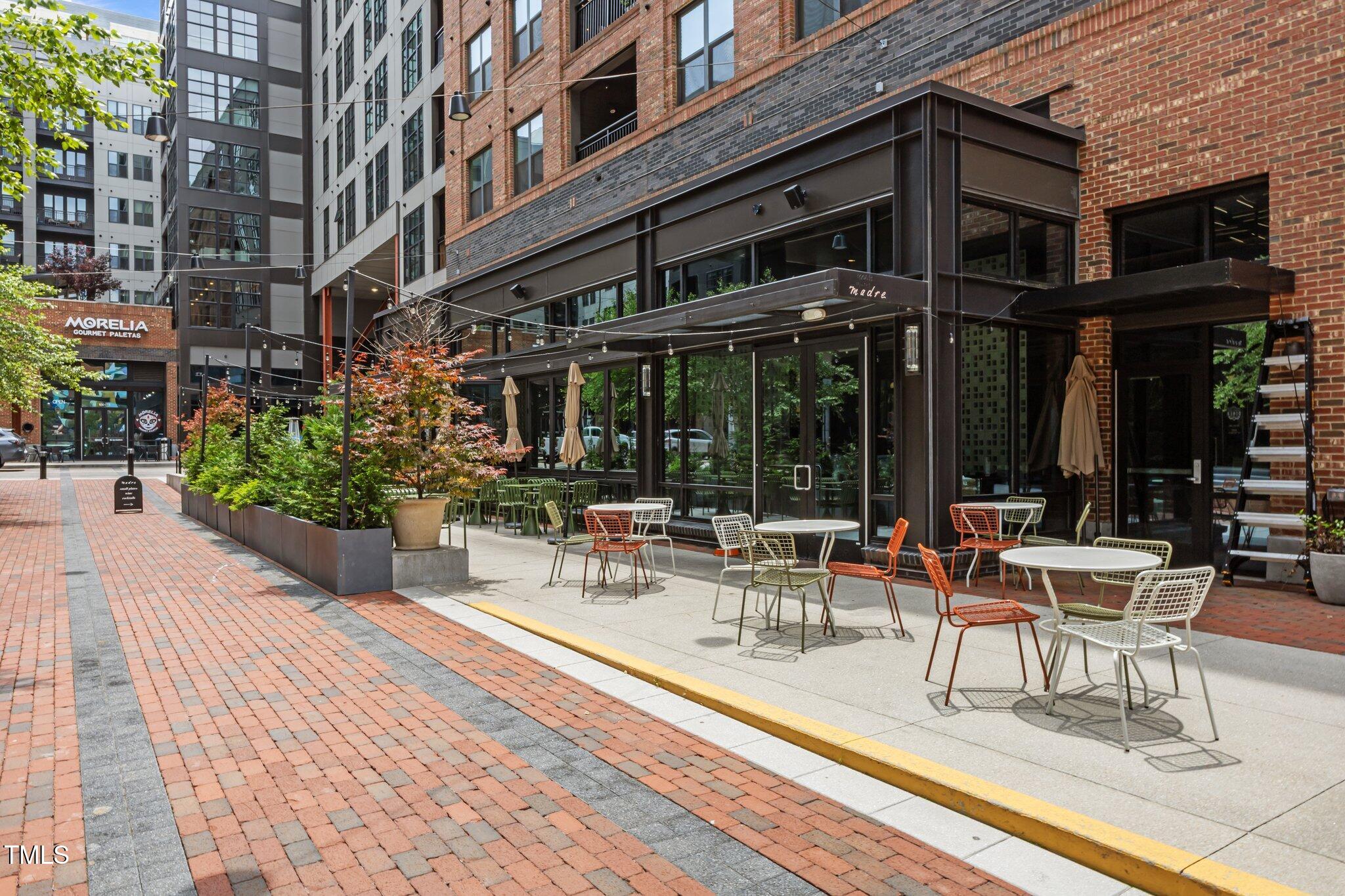 618 North Boylan Avenue, Unit 1032 Raleigh, NC 27603 - Photo 48 of 69 a view of a building with sitting area