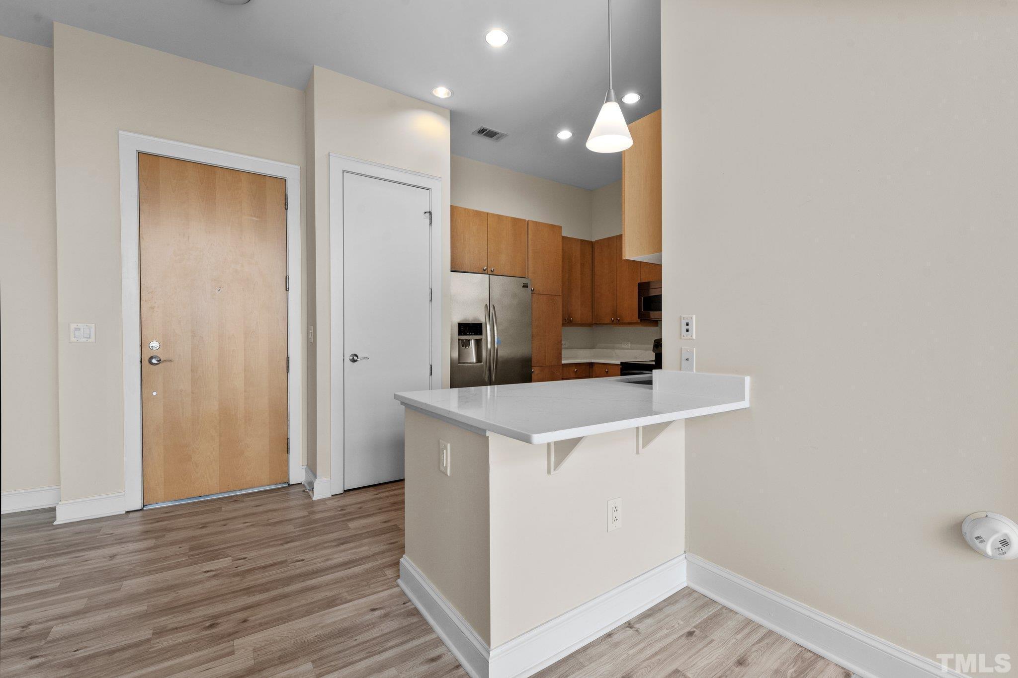618 North Boylan Avenue, Unit 1032 Raleigh, NC 27603 - Photo 8 of 69 a view of a kitchen with a sink