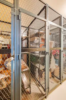 a view of washer and dryer with kitchen in the background