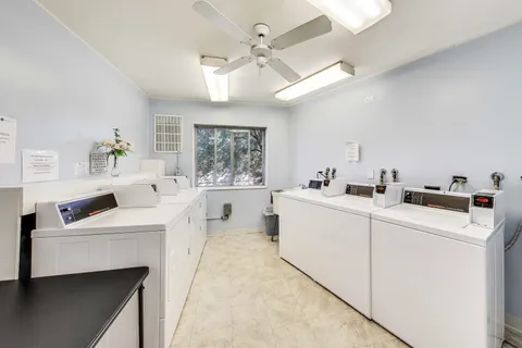 a view of a building with a street