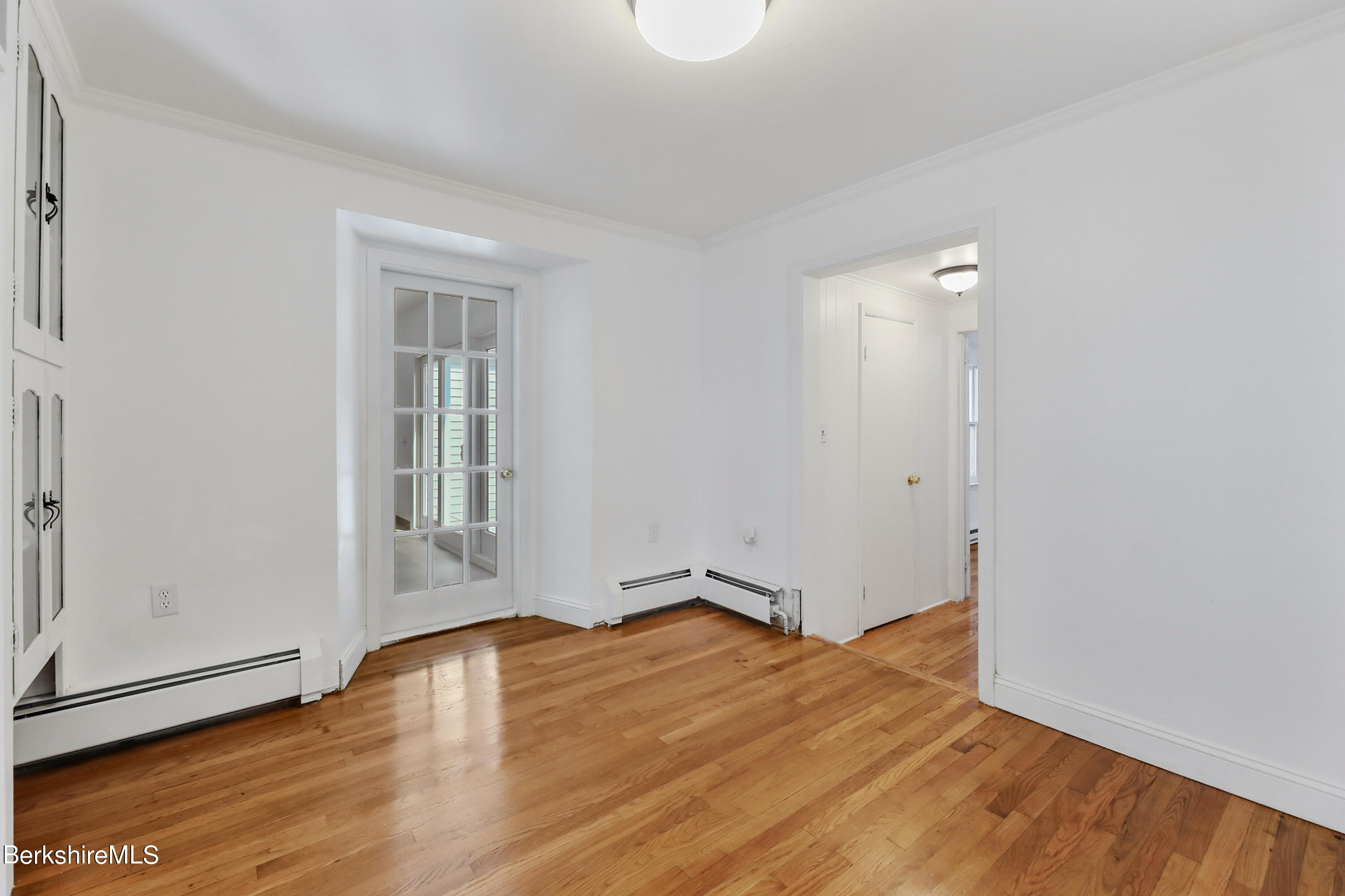 99 Lyman Street Pittsfield, MA 01201 - Photo 12 of 38 wooden floor in an empty room