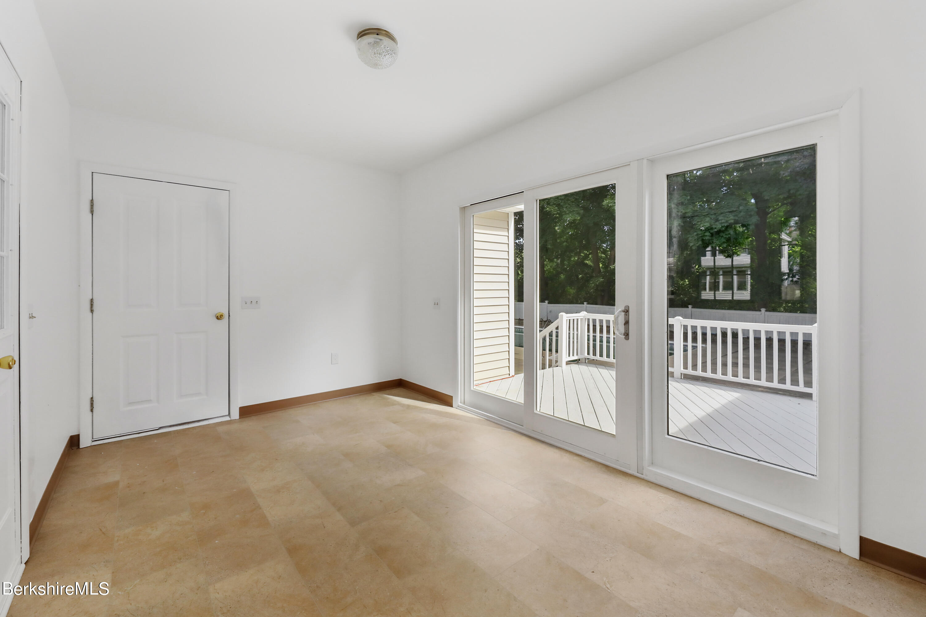 99 Lyman Street Pittsfield, MA 01201 - Photo 20 of 38 an empty room with a large window