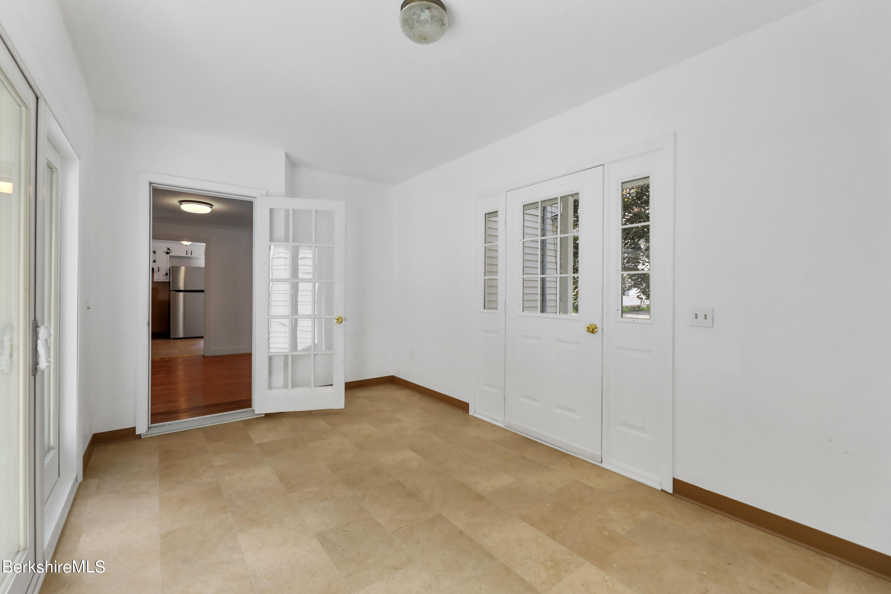 99 Lyman Street Pittsfield, MA 01201 - Photo 21 of 38 an empty room with windows