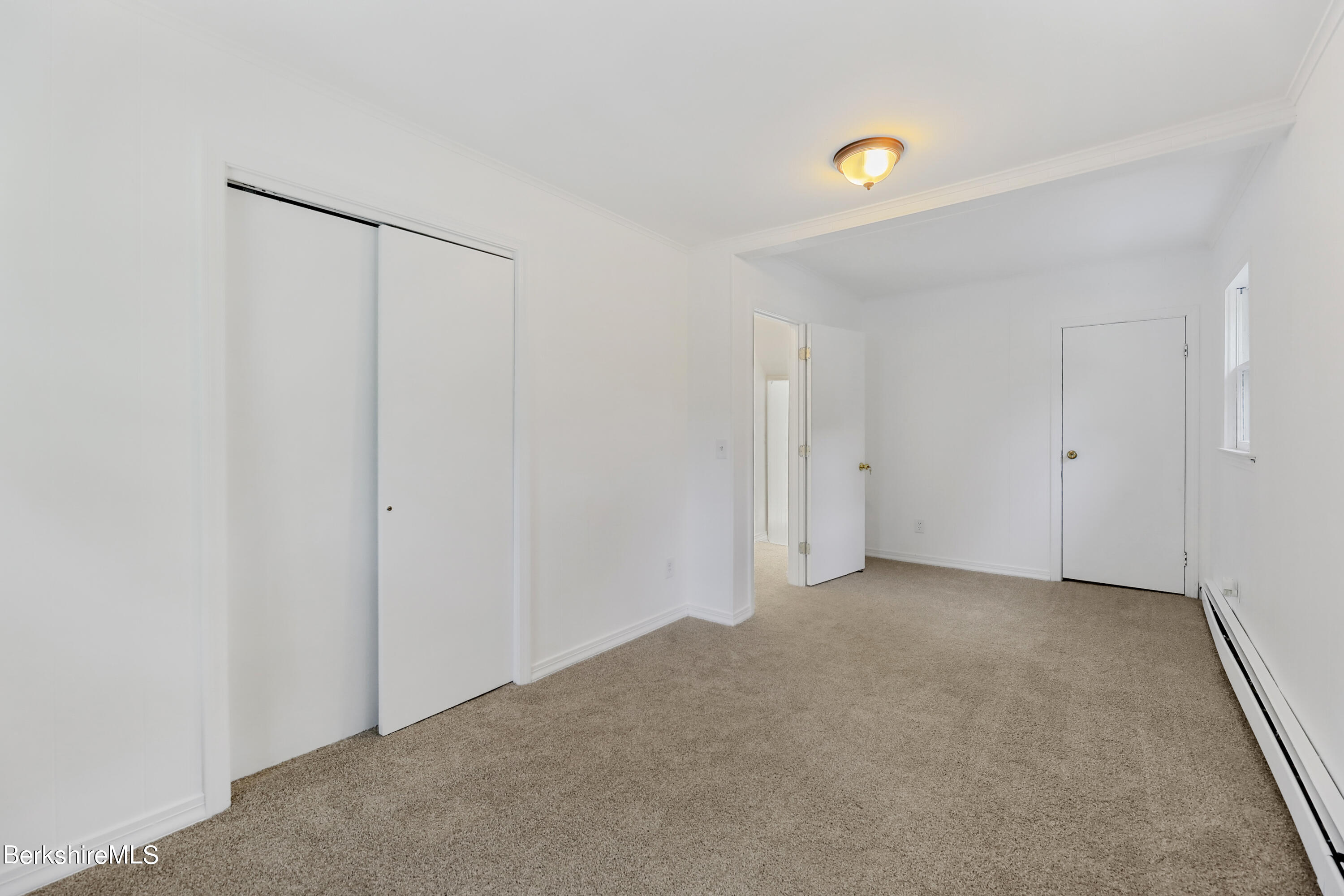 99 Lyman Street Pittsfield, MA 01201 - Photo 23 of 38 a view of an empty room