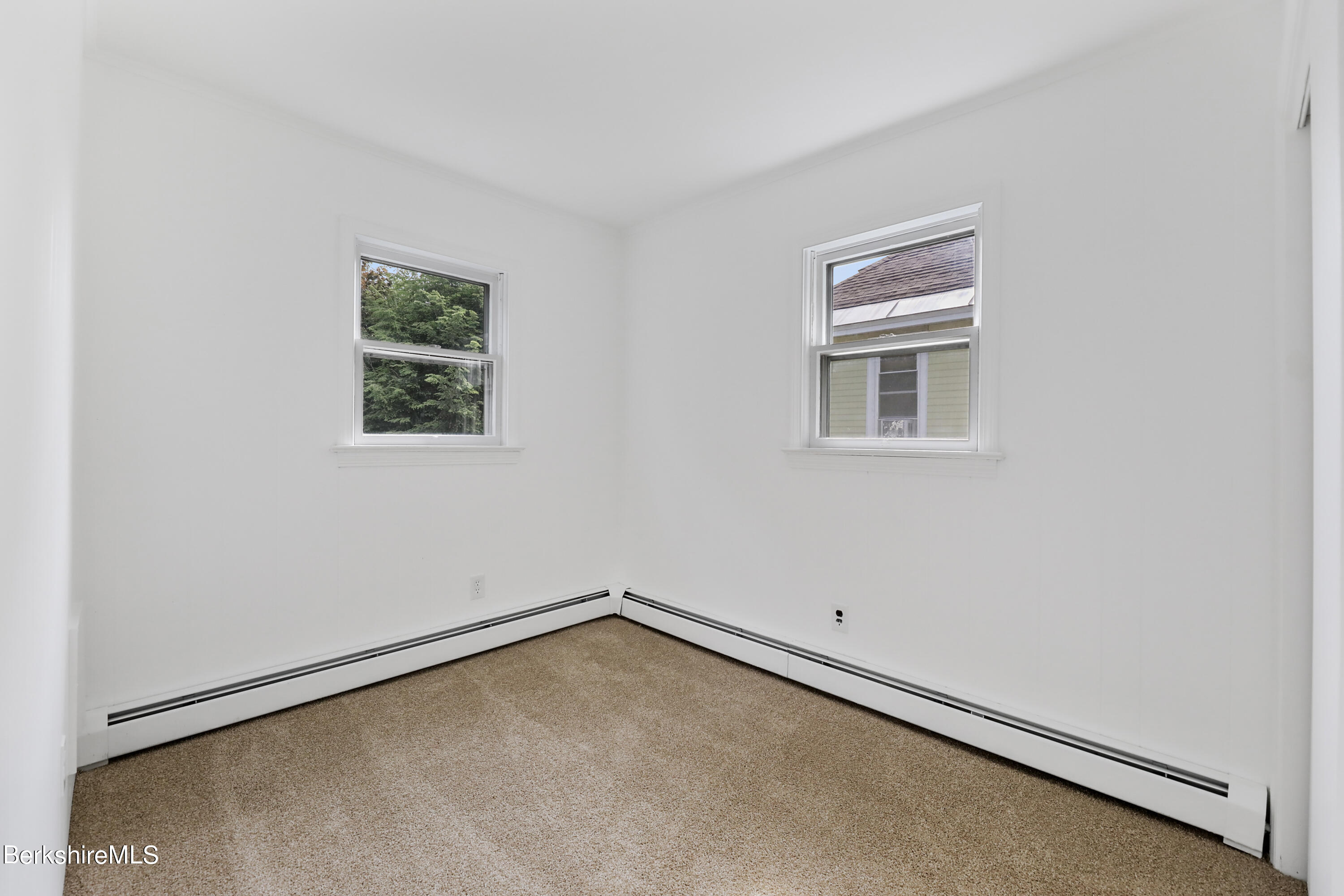 99 Lyman Street Pittsfield, MA 01201 - Photo 24 of 38 an empty room with a window