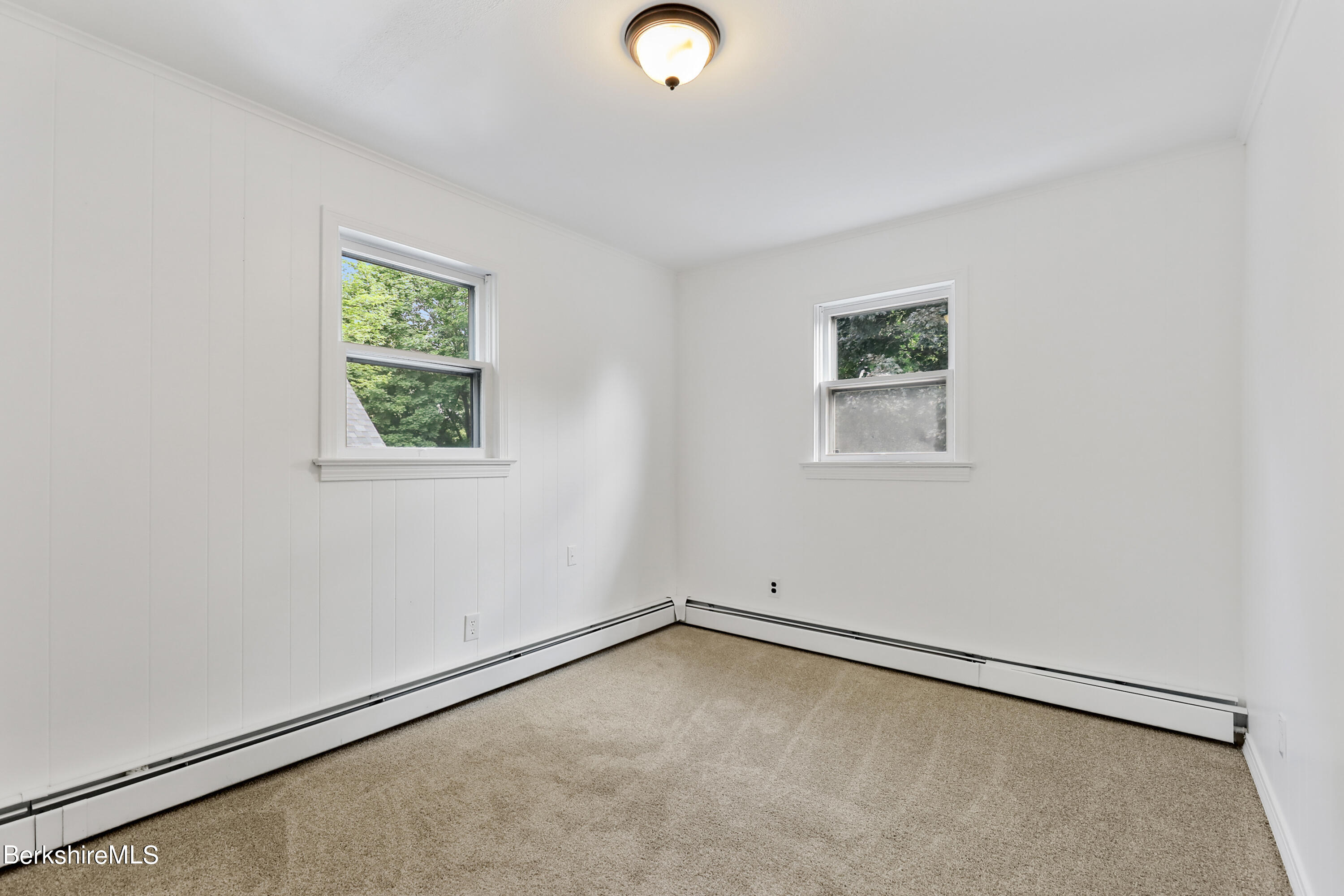 99 Lyman Street Pittsfield, MA 01201 - Photo 26 of 38 an empty room with a window
