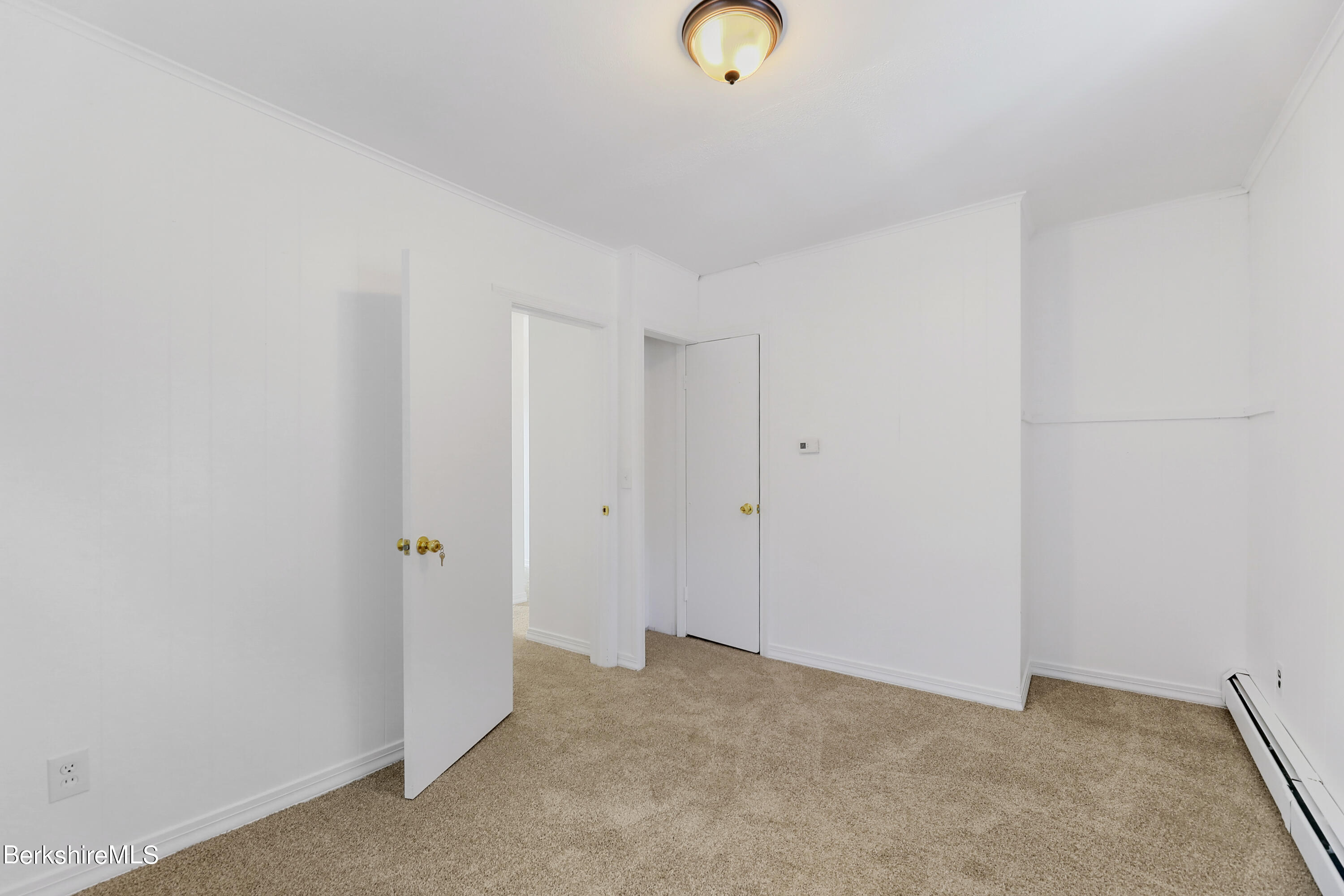 99 Lyman Street Pittsfield, MA 01201 - Photo 27 of 38 a view of an empty room