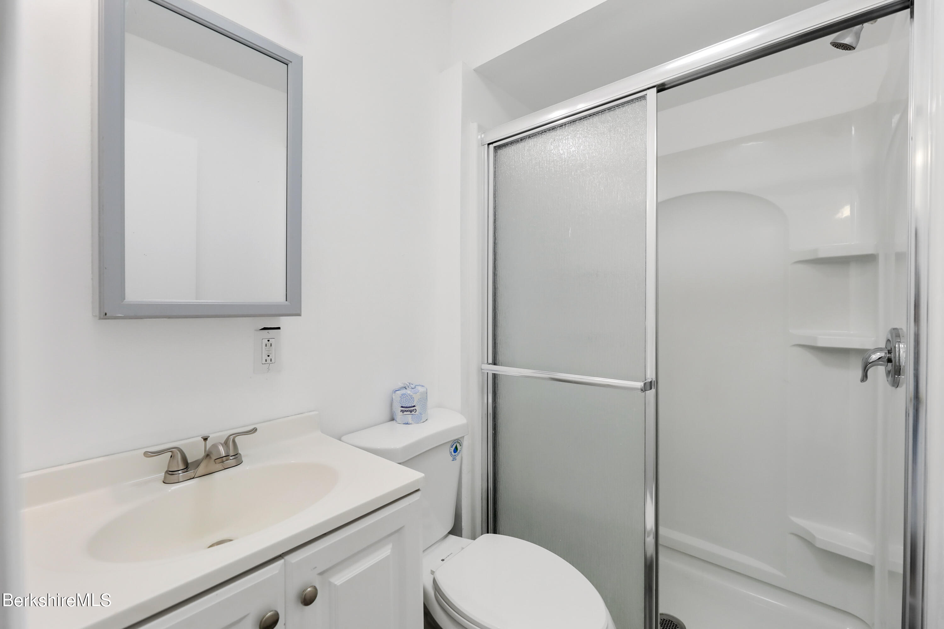 99 Lyman Street Pittsfield, MA 01201 - Photo 28 of 38 a bathroom with a sink toilet and shower