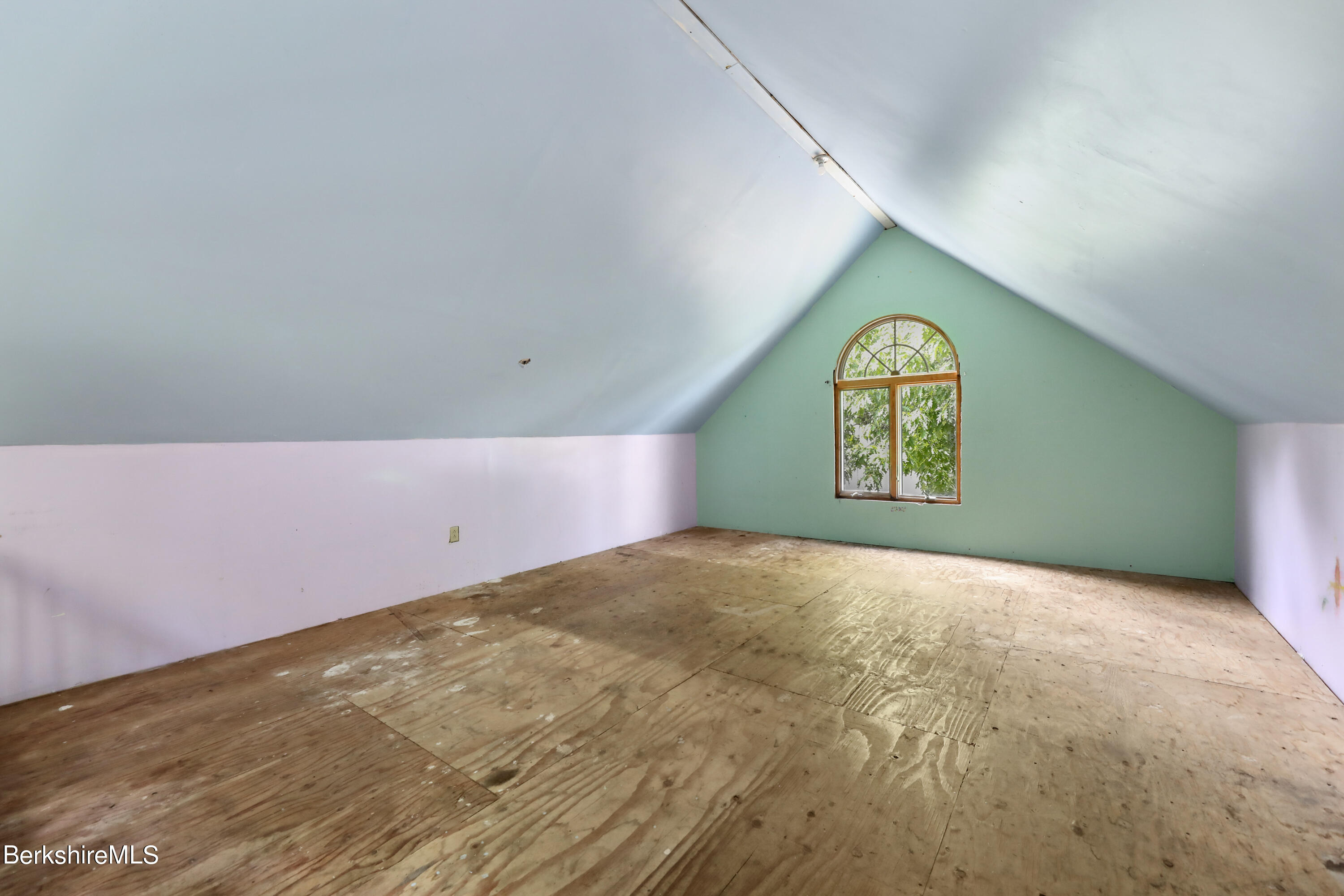99 Lyman Street Pittsfield, MA 01201 - Photo 29 of 38 a view of an empty room with a window