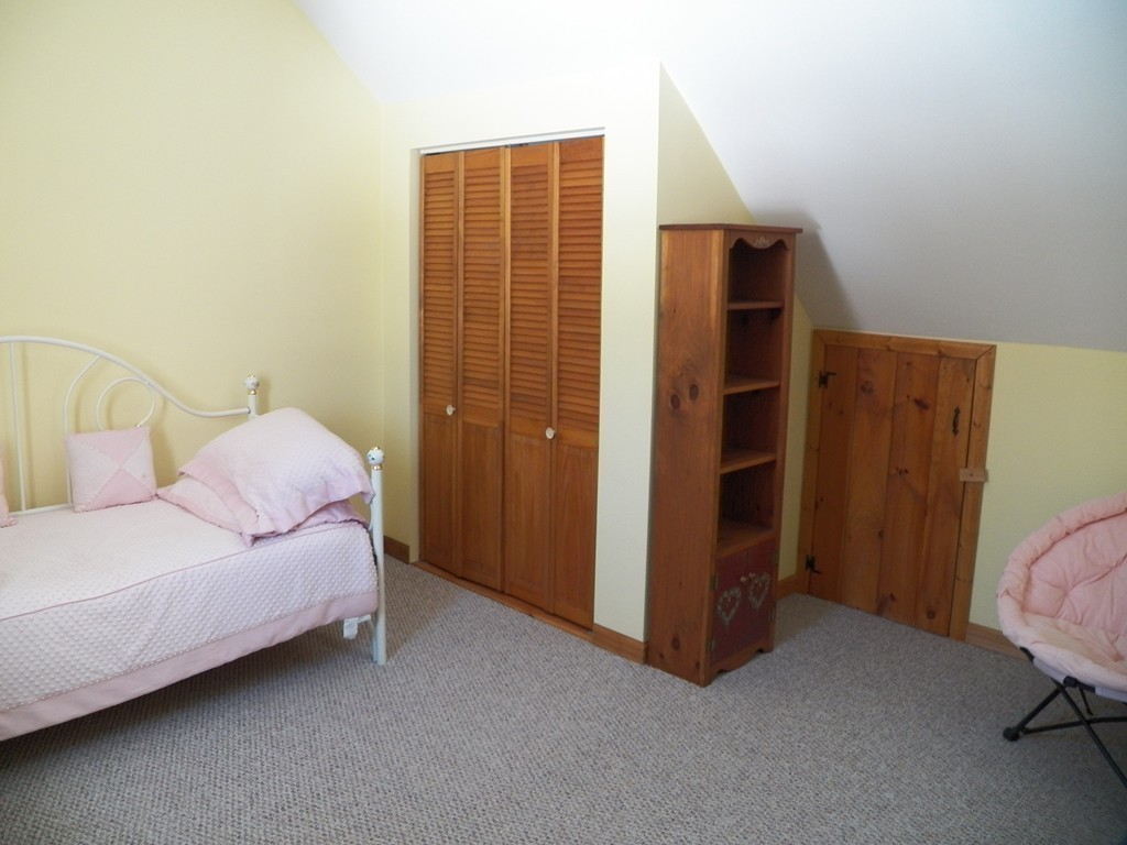 1376 Patrill Hollow Road Hardwick, MA 01082 - Photo 12 of 16 a bedroom with a bed and a closet