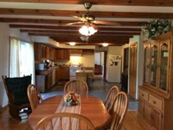 1376 Patrill Hollow Road Hardwick, MA 01082 - Photo 6 of 16 a view of a dining room with furniture