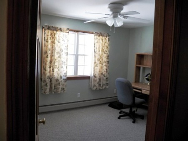 1376 Patrill Hollow Road Hardwick, MA 01082 - Photo 10 of 16 a view of a workspace with furniture and a window