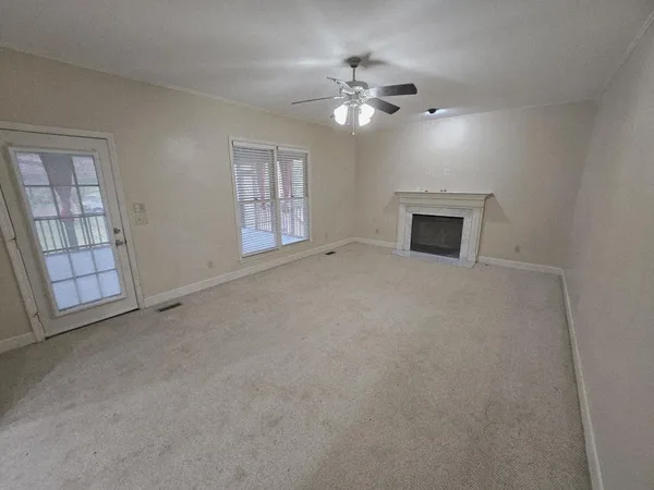 a spacious bathroom with a double vanity sink and a mirror