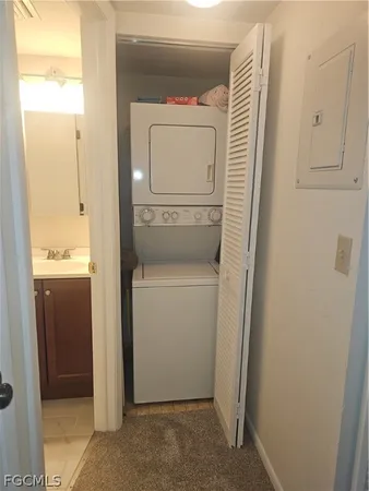 a kitchen with a refrigerator stove and sink