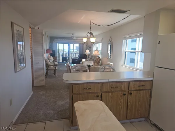 a kitchen with a stove microwave and refrigerator