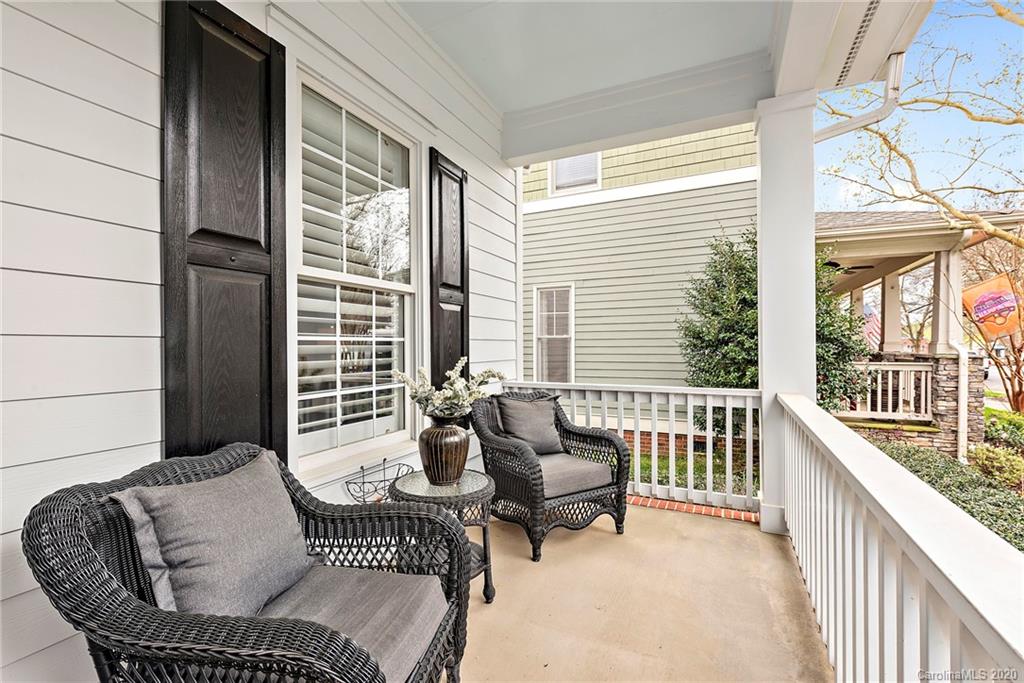 527 Fourth Baxter Crossing Fort Mill, SC 29708 - Photo 2 of 27 a balcony with furniture and a porch