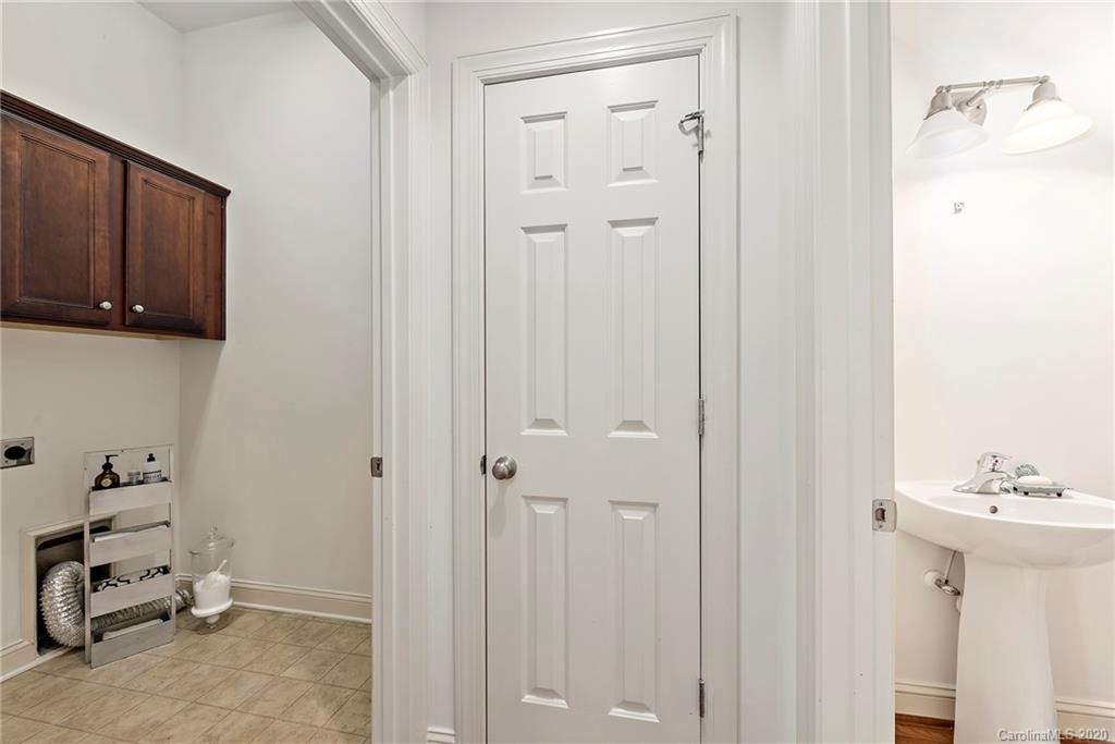 527 Fourth Baxter Crossing Fort Mill, SC 29708 - Photo 18 of 27 a bathroom with a sink and a mirror