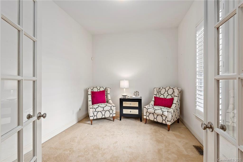 527 Fourth Baxter Crossing Fort Mill, SC 29708 - Photo 19 of 27 a living room with furniture and a bed