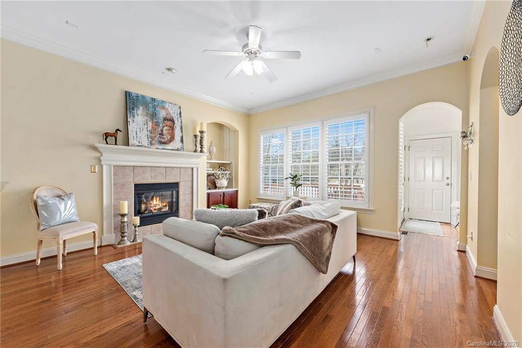 527 Fourth Baxter Crossing Fort Mill, SC 29708 - Photo 3 of 27 a living room with furniture and a fireplace