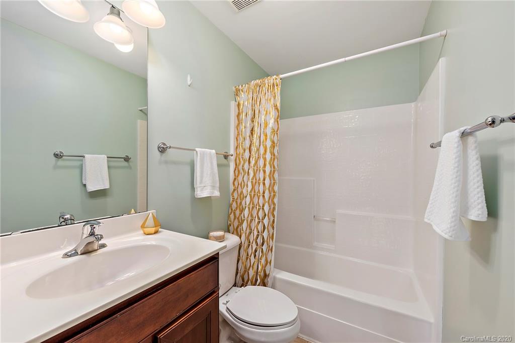 527 Fourth Baxter Crossing Fort Mill, SC 29708 - Photo 23 of 27 a bathroom with a sink toilet and shower