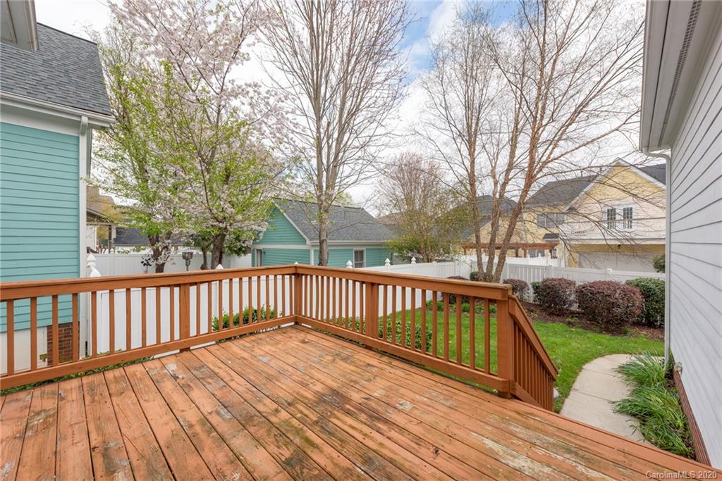 527 Fourth Baxter Crossing Fort Mill, SC 29708 - Photo 25 of 27 a view of backyard with deck and trees