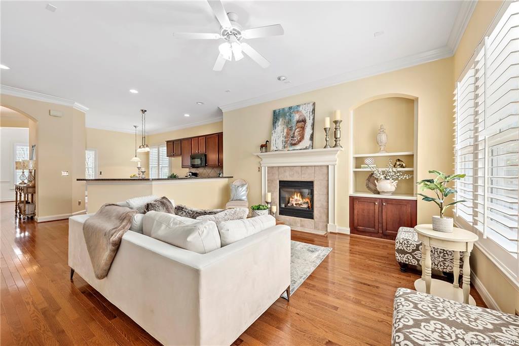 527 Fourth Baxter Crossing Fort Mill, SC 29708 - Photo 4 of 27 a living room with furniture and a fireplace
