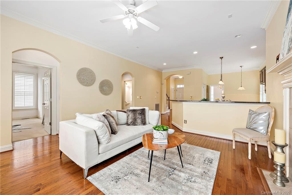 527 Fourth Baxter Crossing Fort Mill, SC 29708 - Photo 6 of 27 a living room with furniture and wooden floor