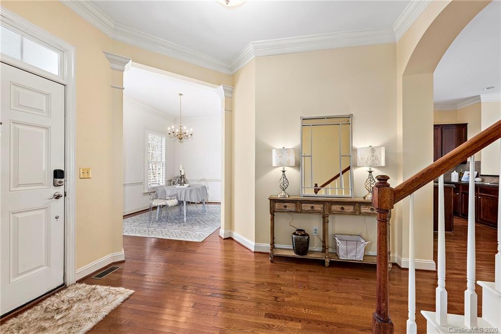 527 Fourth Baxter Crossing Fort Mill, SC 29708 - Photo 7 of 27 a living room with furniture and a wooden floor