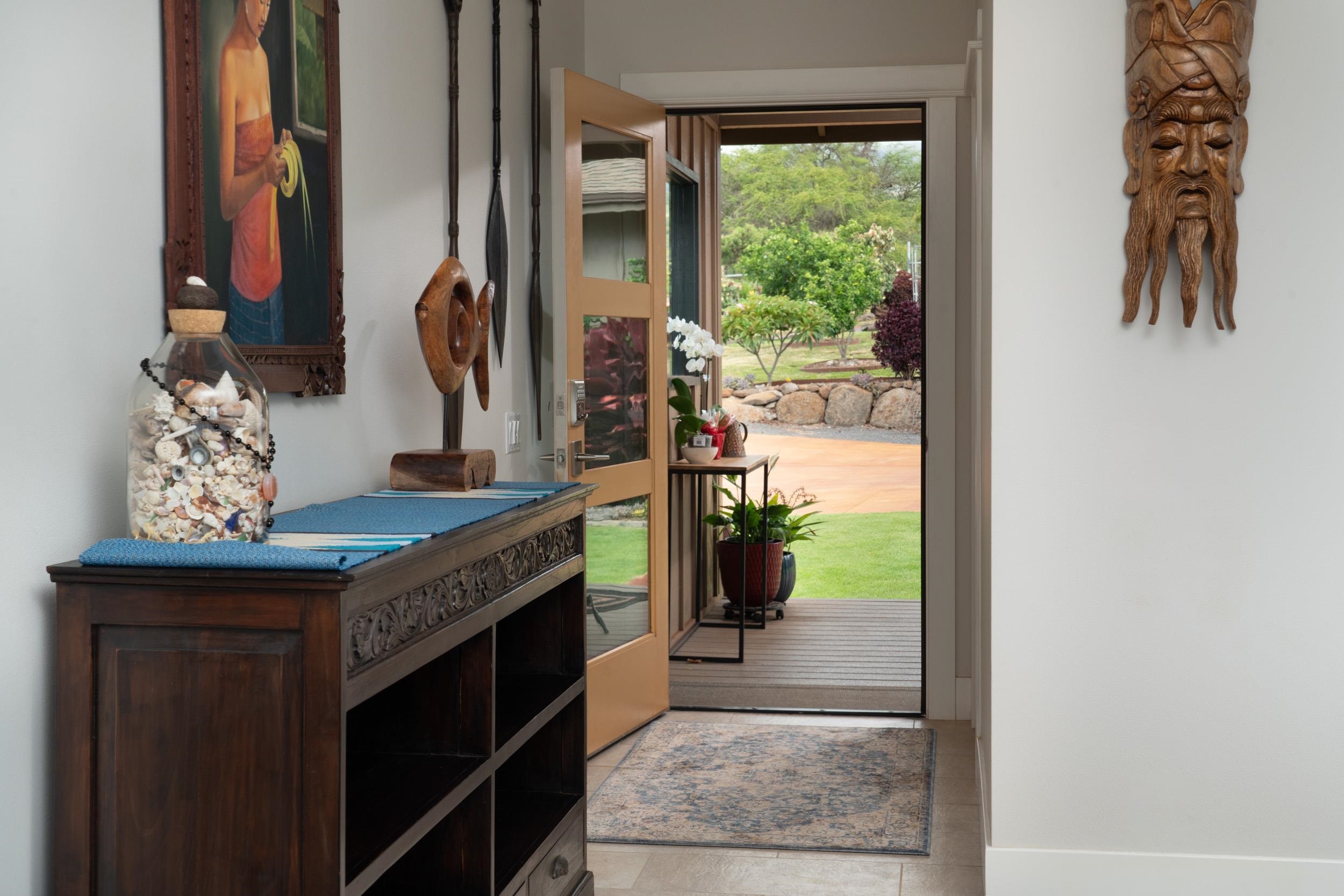 126 Hoomaikai Place Kula, HI 96790 - Photo 15 of 50 a kitchen with a stove and a shower
