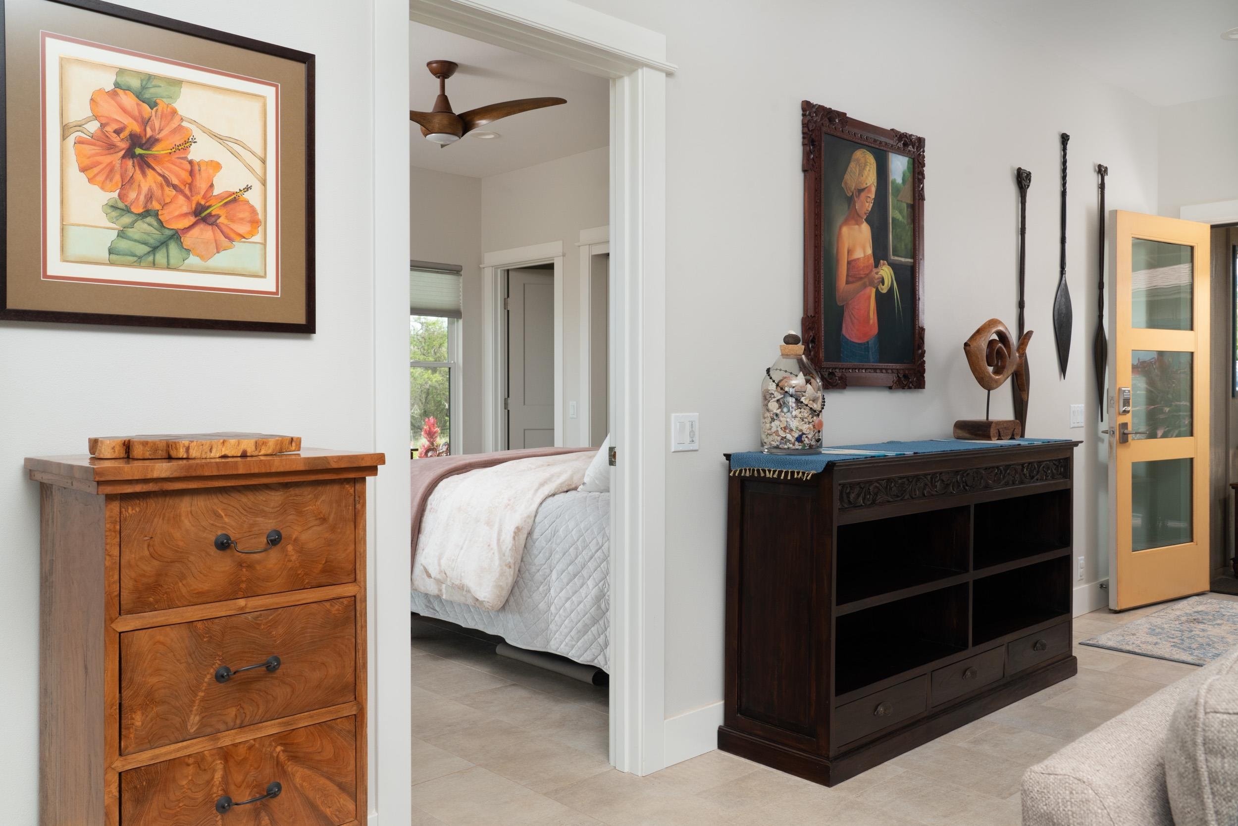 126 Hoomaikai Place Kula, HI 96790 - Photo 17 of 50 a bedroom with a bed and a dresser