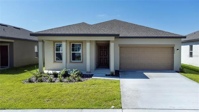 a front view of house with yard