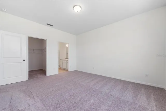 an empty room with an entryway