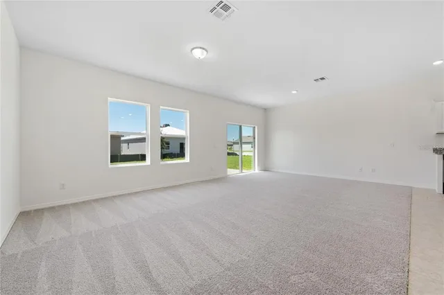 a view of empty room with a window