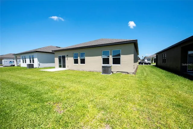 a front view of house with yard