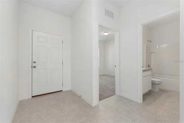 a view of a bathroom with a toilet