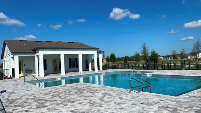 an aerial view of a house with garden