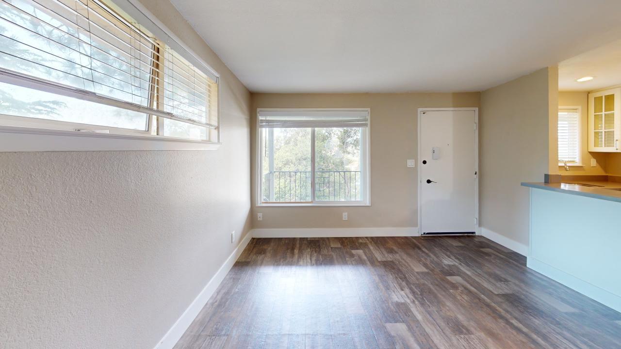 7 Merrydale Road San Rafael, CA 94903 - Photo 12 of 14 a view of wooden floor and windows in a room
